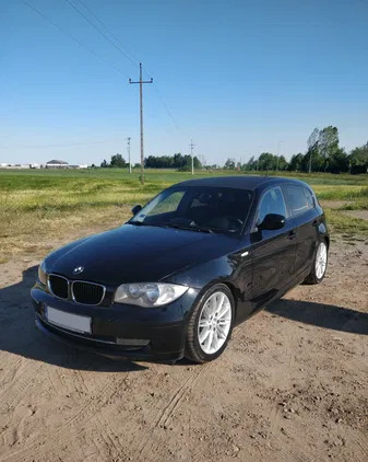 BMW Seria 1 cena 22900 przebieg: 210000, rok produkcji 2009 z Rawicz małe 172